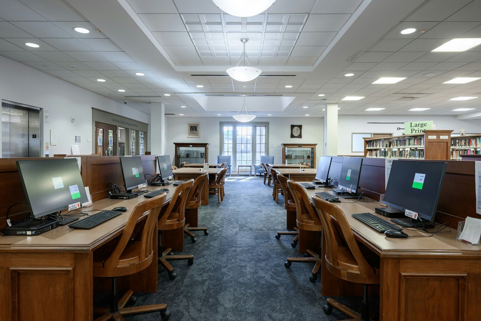 Two rows of computer stations at the library.
