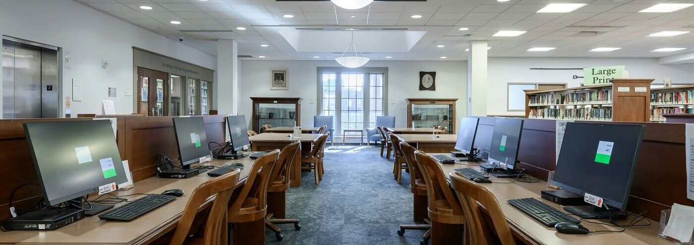 Two rows of computer stations at the library.